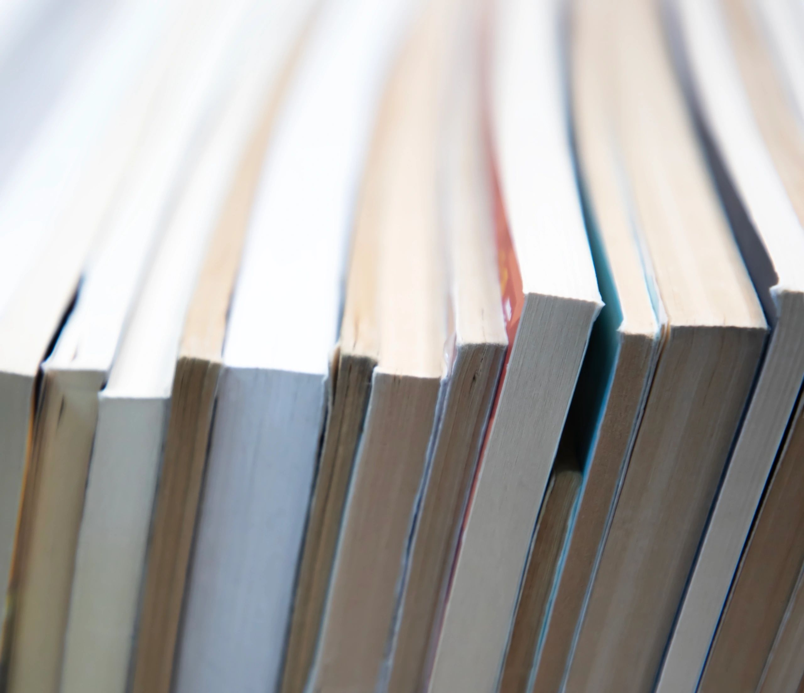 Stack of books with warm neutral tones