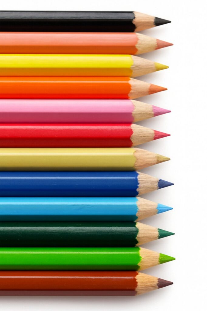 Row of Sharpened Colored Pencils Isolated on White Background